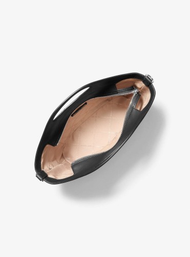 Michael Kors Tatum Medium Convertible Crossbody – torebka damska na modelce