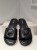 michael-kors-black-leather-slide-sandals-mk-logo.jpg